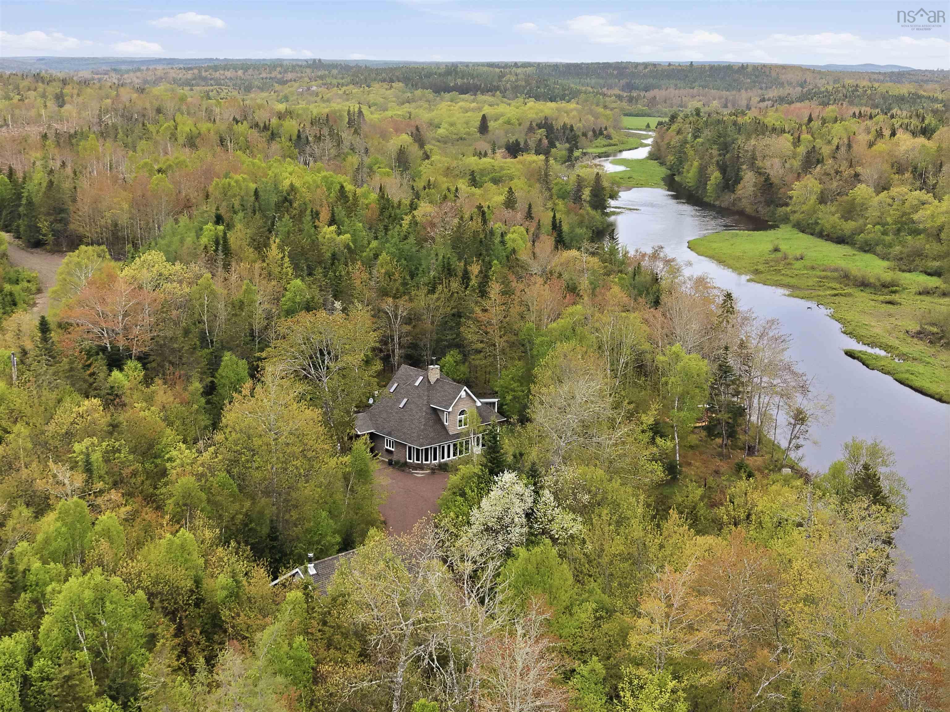 2.66-Acre Riverfront Home: Easy One-Level Living in Aspen NS