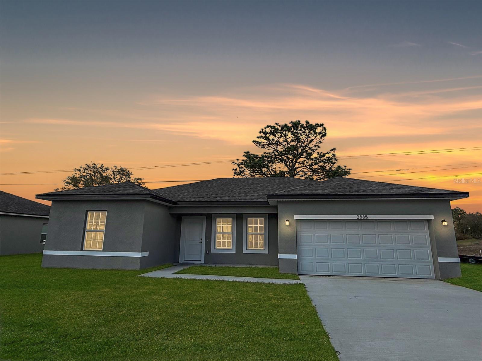 New 4/2 Build: Open Kitchen, Garage & Spacious Yard