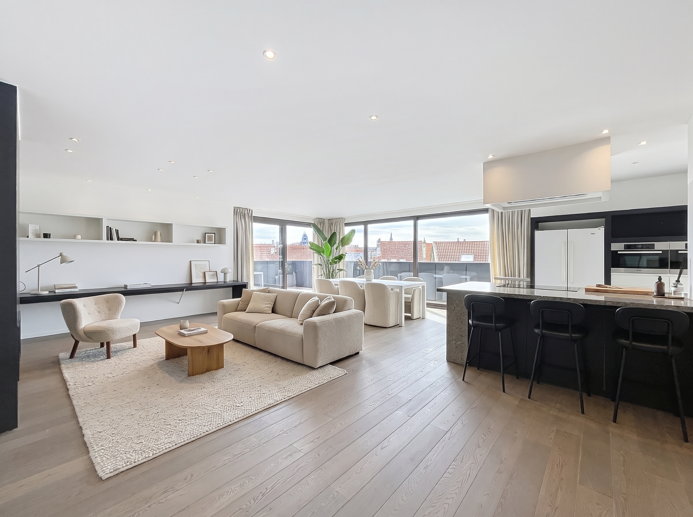Prachtig penthouse met twee slaapkamers, ruim terras en parkeerplaats in hartje Brussel [AI-bewerkt]