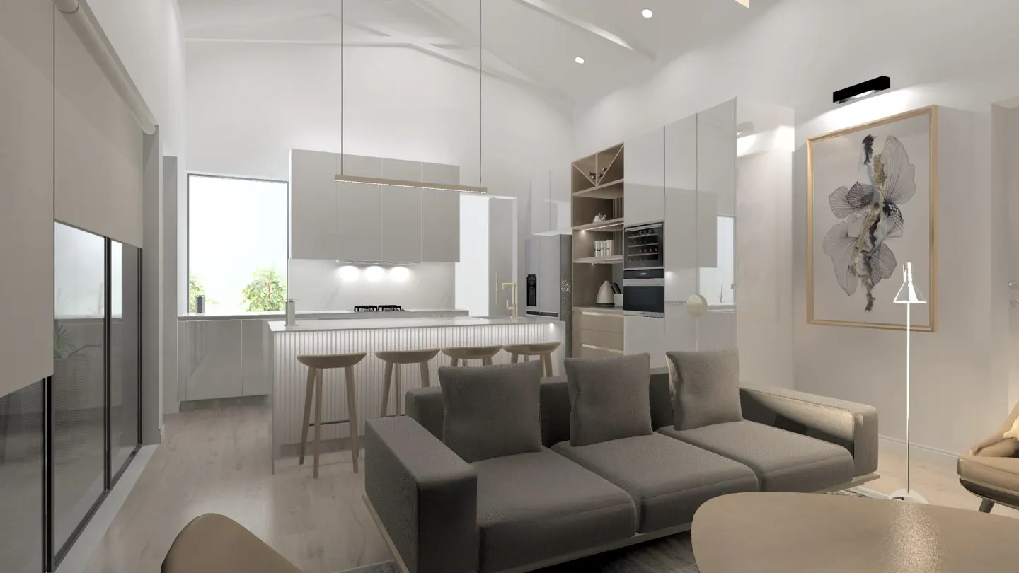 Bright, modern open-concept living space with gray sofa, kitchen island with stools, and white cabinets. Artwork hangs on the wall.