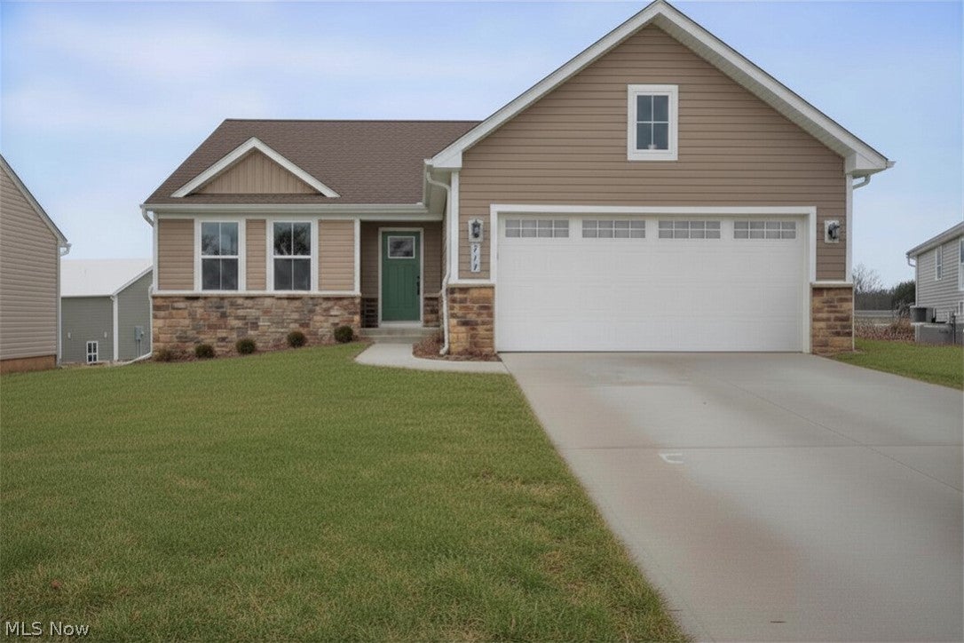2025-Built Ranch Home in Lakemore Village's Hidden Lakes