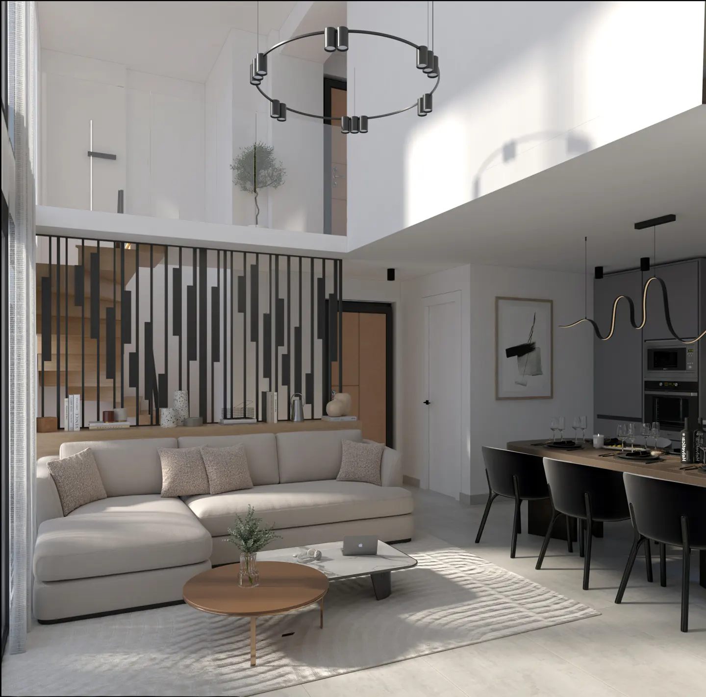 Bright, modern living room with a beige sectional sofa, round coffee table, and dining area with black chairs. A staircase is visible behind a decorative partition.