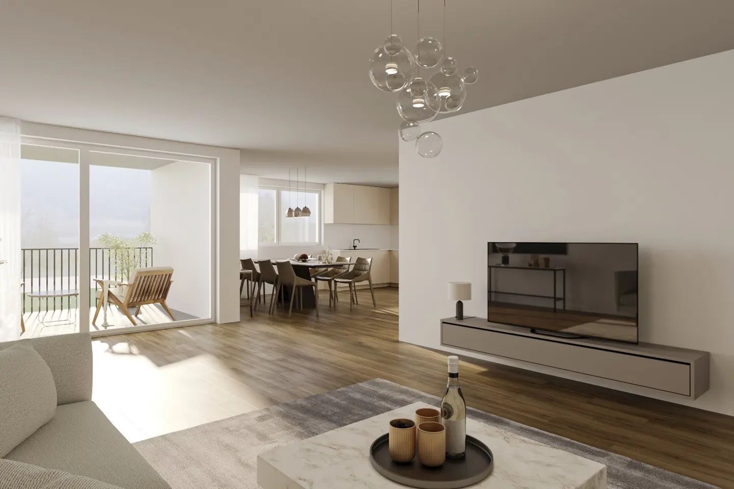 Bright, modern living room with a balcony, dining area, and kitchen. A bubble chandelier hangs above a marble coffee table with a bottle of wine.