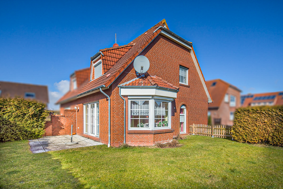 Norddeich: Vermietet und gepflegt – solide Kapitalanlage mit Garten und Stellplatz