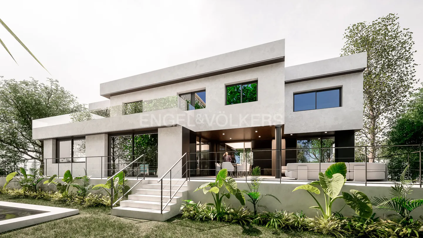 Modern two-story house with a flat roof, white exterior, black trim, and a patio with furniture. Lush greenery surrounds the property.