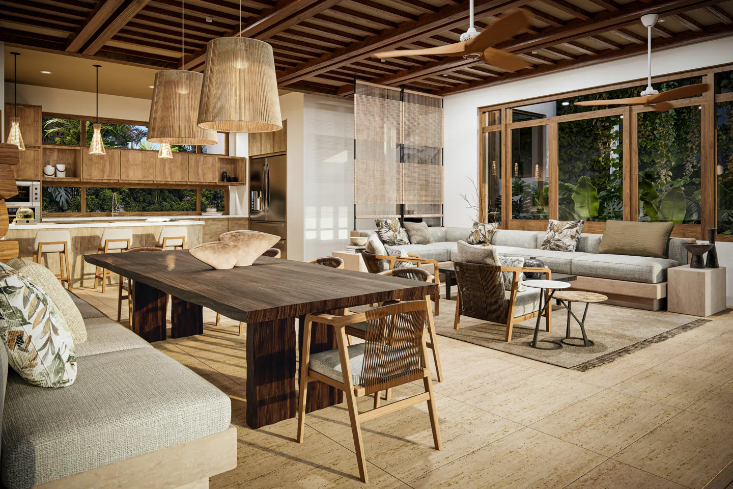 Open-concept living space with a dark wood table, light gray sofas, and a kitchen in the background. Large windows overlook lush greenery.