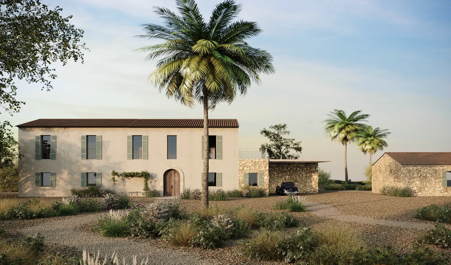 A two-story beige house with green shutters and a brown roof, with palm trees in the yard.