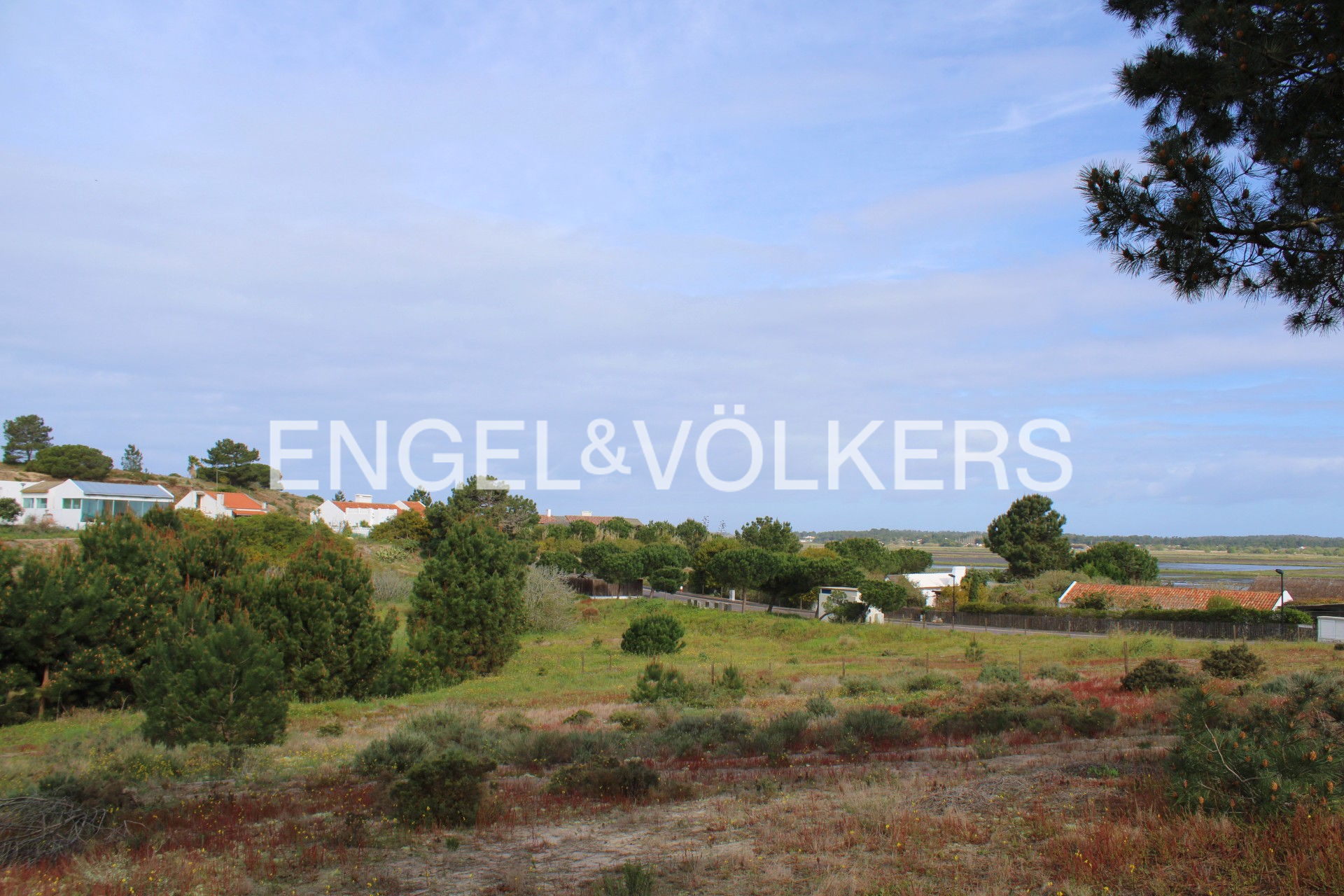 Plot of land overlooking rice paddies with architectural approved project