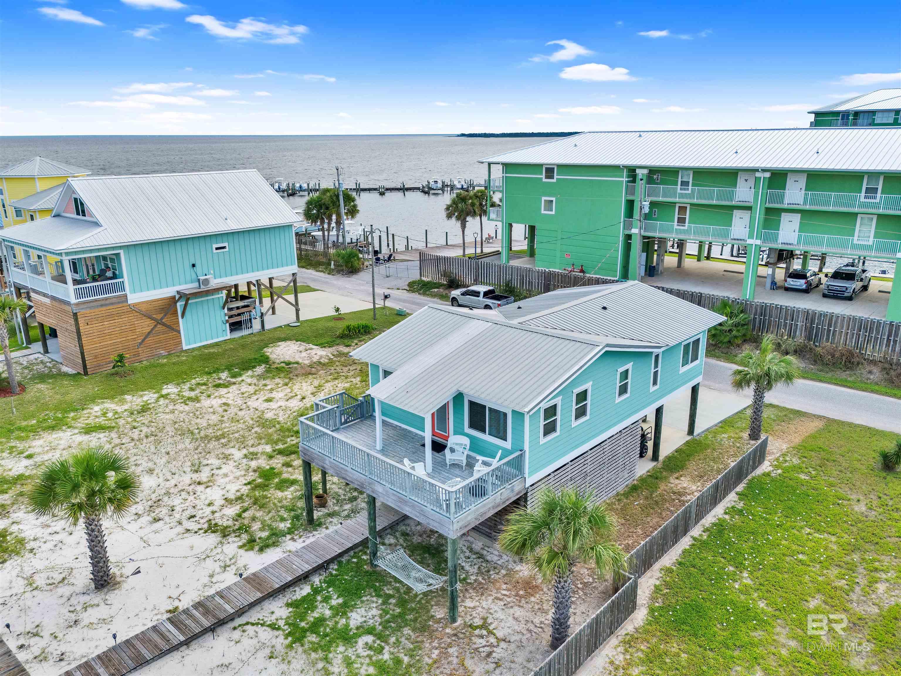 Bayfront Beach Cottage with Boat Slip & Lift
