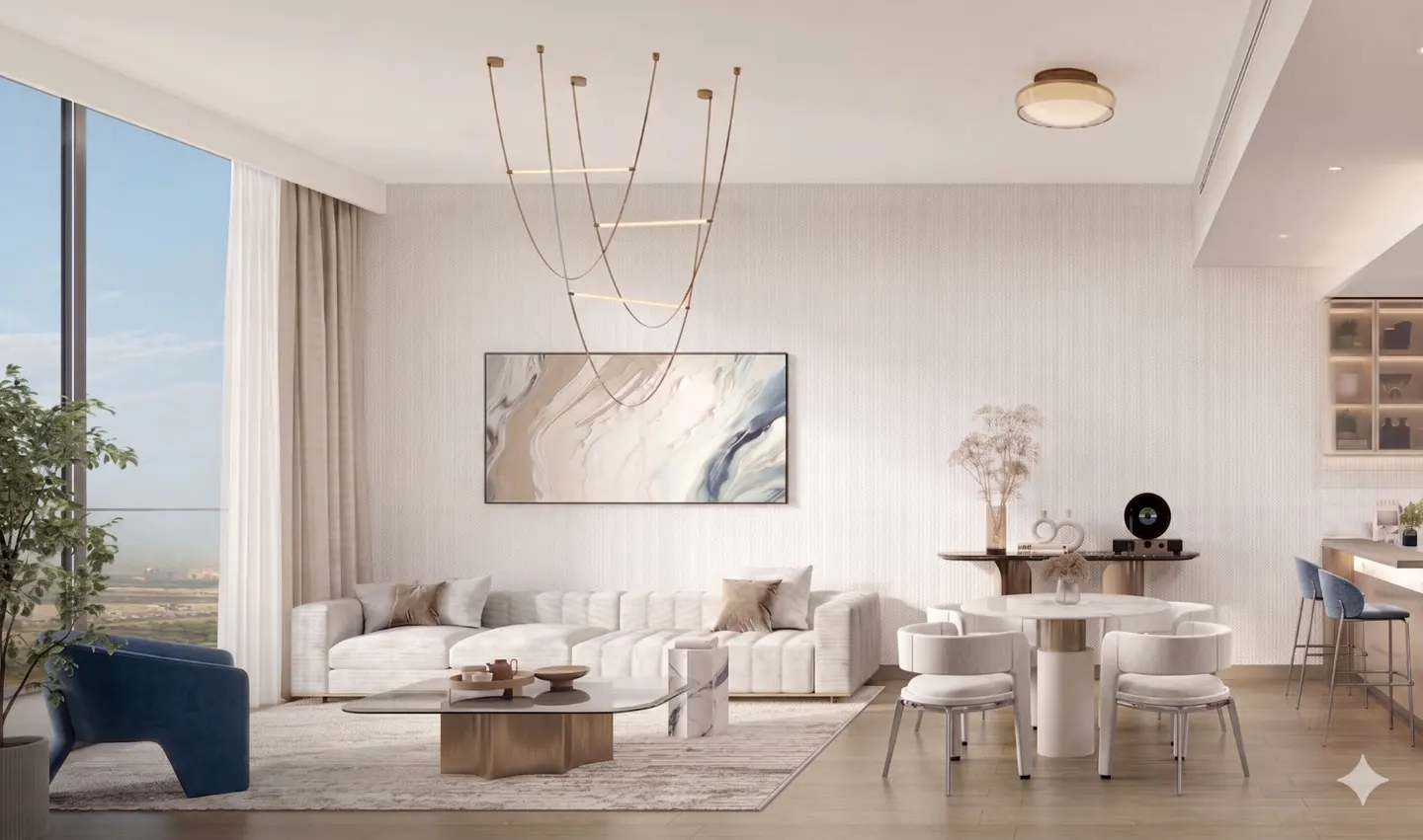 Modern living room with a white sofa, blue armchair, marble coffee table, dining area, and abstract art under a gold light.
