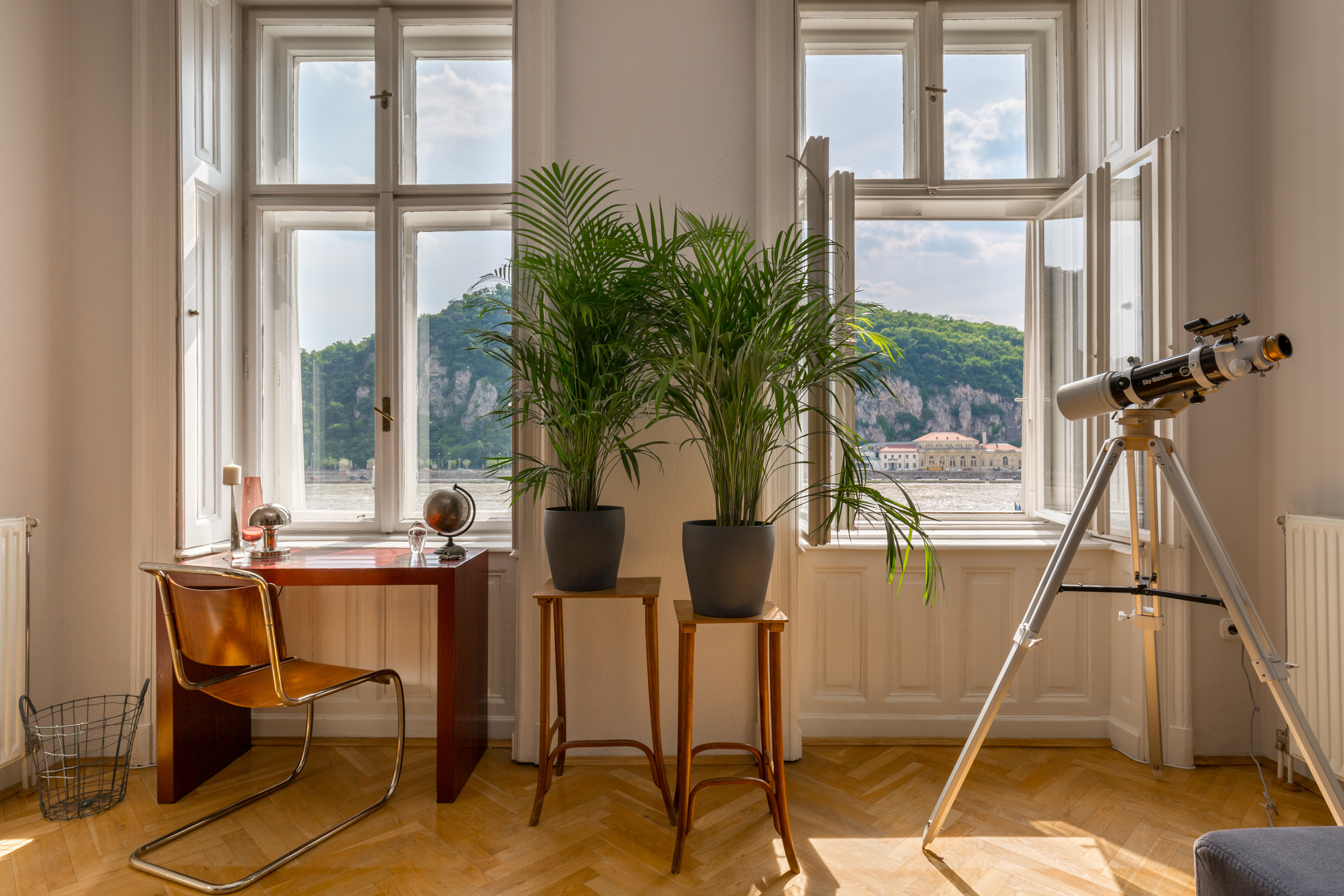 Luxury apartment with panoramic Danube and Gellért Hill views, furnished in Indonesian style, for rent on Belgrád rakpart