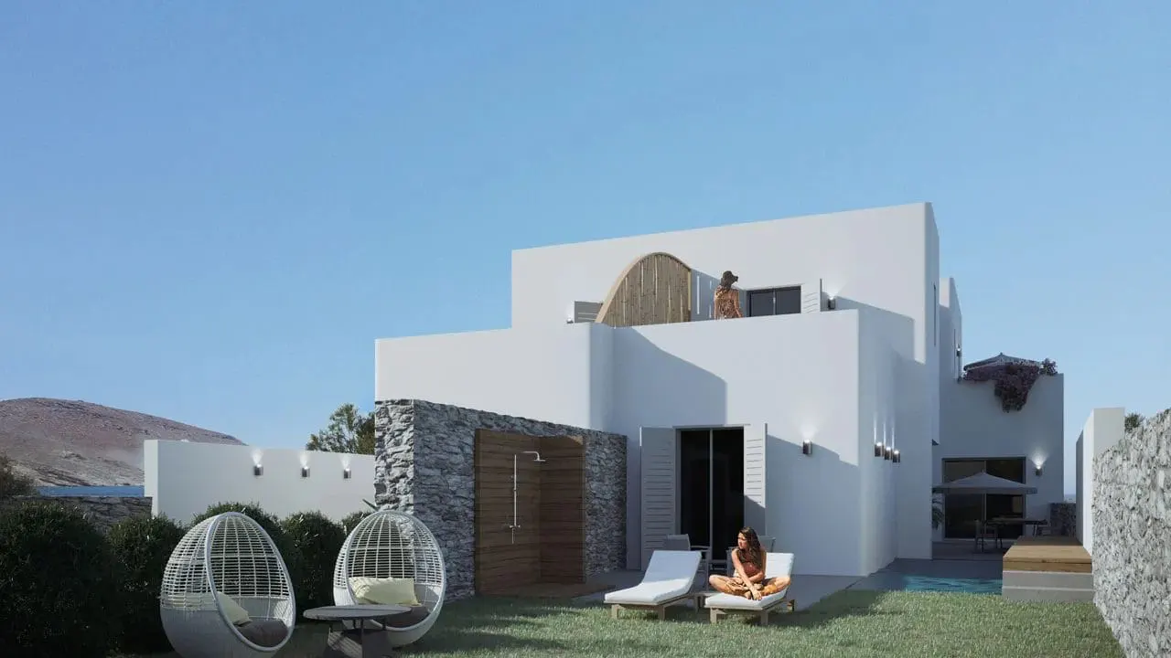 Modern white villa with outdoor shower, pool, and lounge chairs on green lawn. Woman on balcony and another sunbathing.
