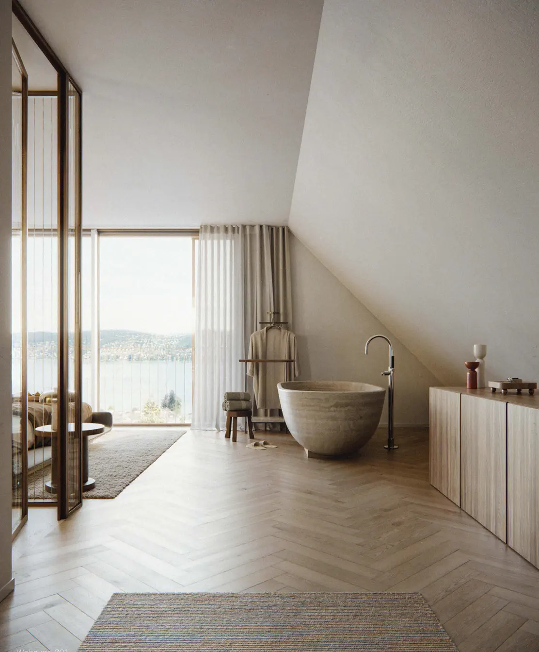 A modern bathroom with a stone tub, wood floors, and a view of a lake through large windows.