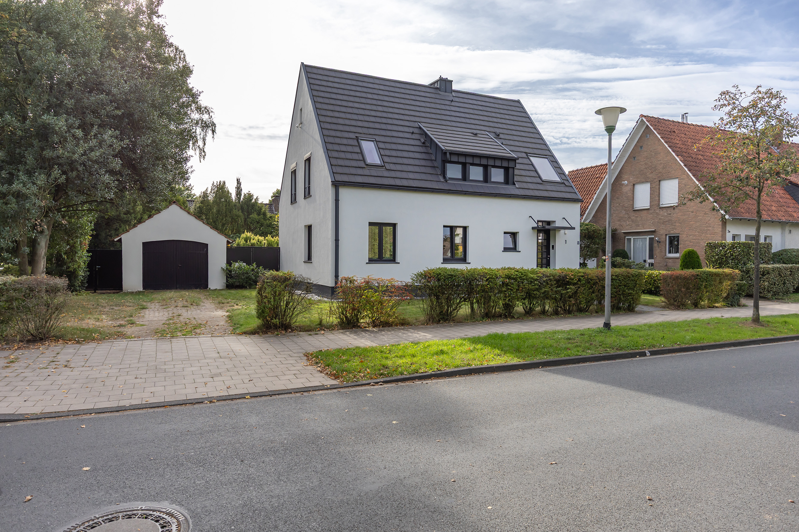 Designstarker Klassiker in Bestlage: Hochwertiges Einfamilienhaus an der Sentruper Höhe