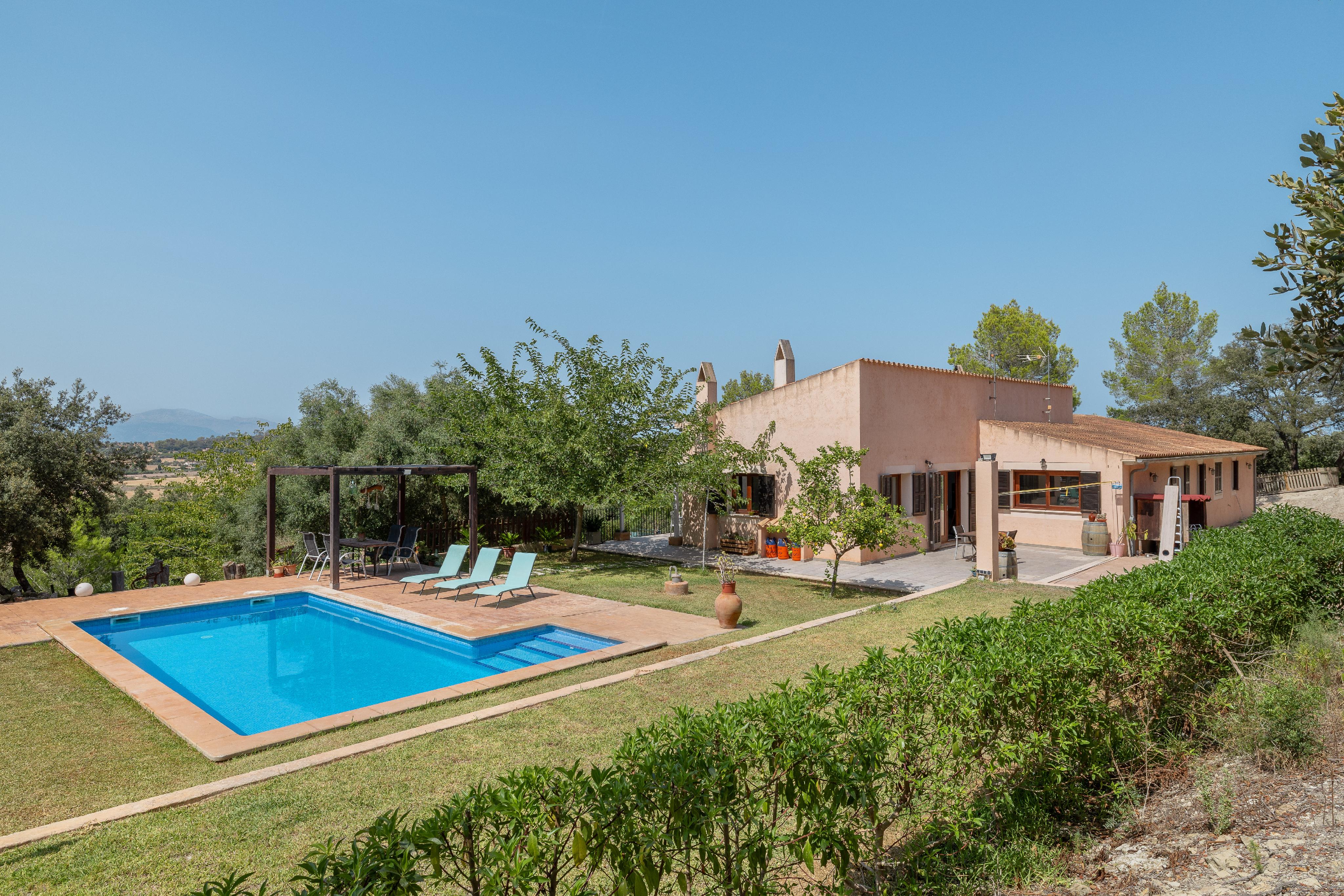 Finca in an elevated position with pool and views