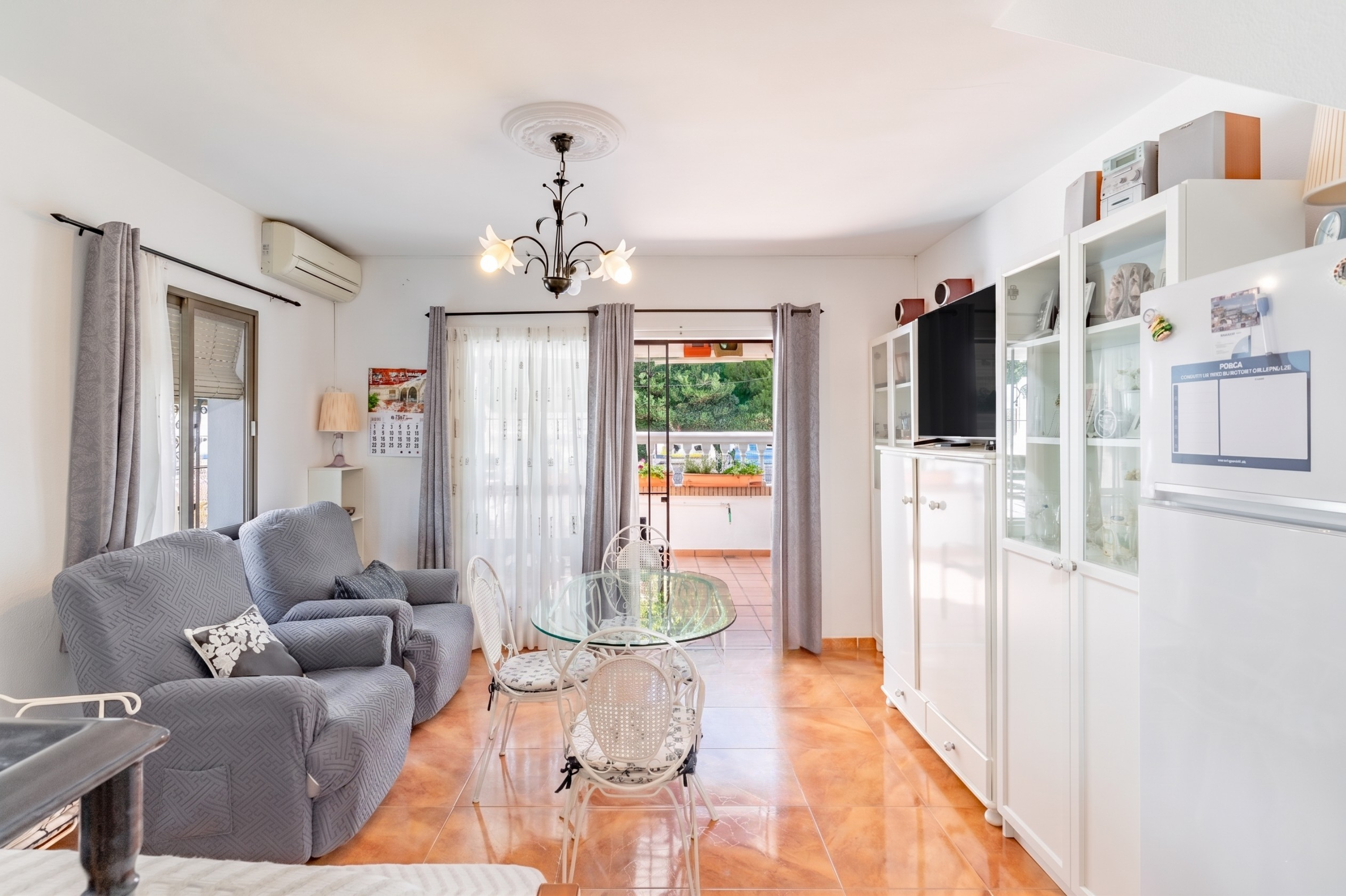 2-bedroom row house with great communal garden, pool, and close to the beach