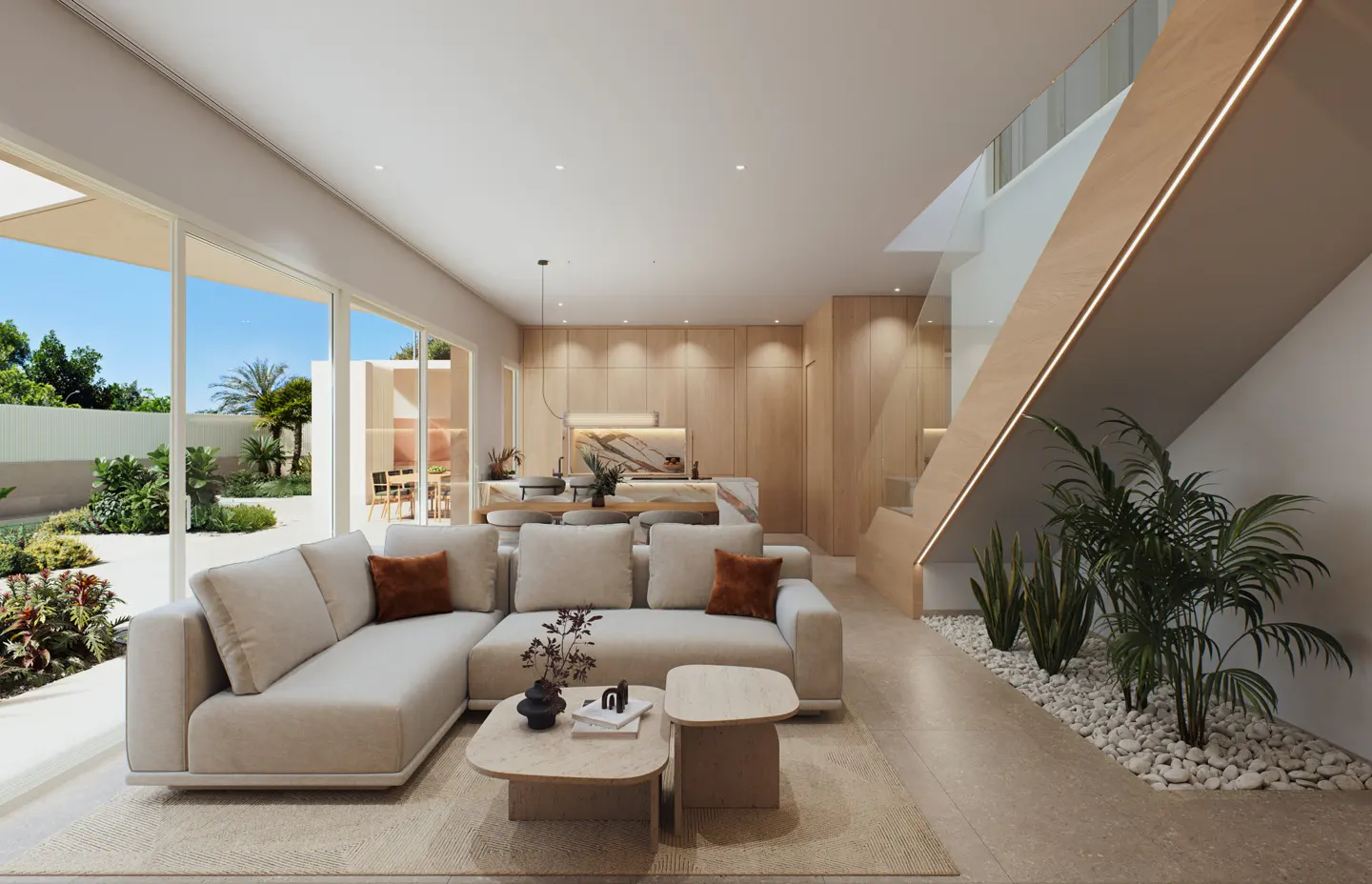 Open-concept living space with a beige sectional sofa, wood stairs, and a view of the outdoor garden.