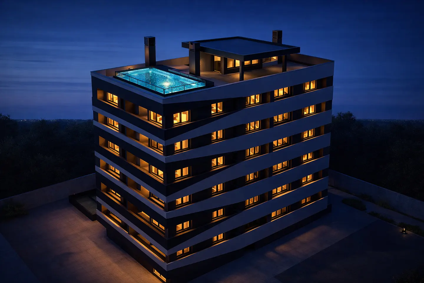 Modern apartment building at night with a rooftop pool. Windows are lit, contrasting with the dark exterior.