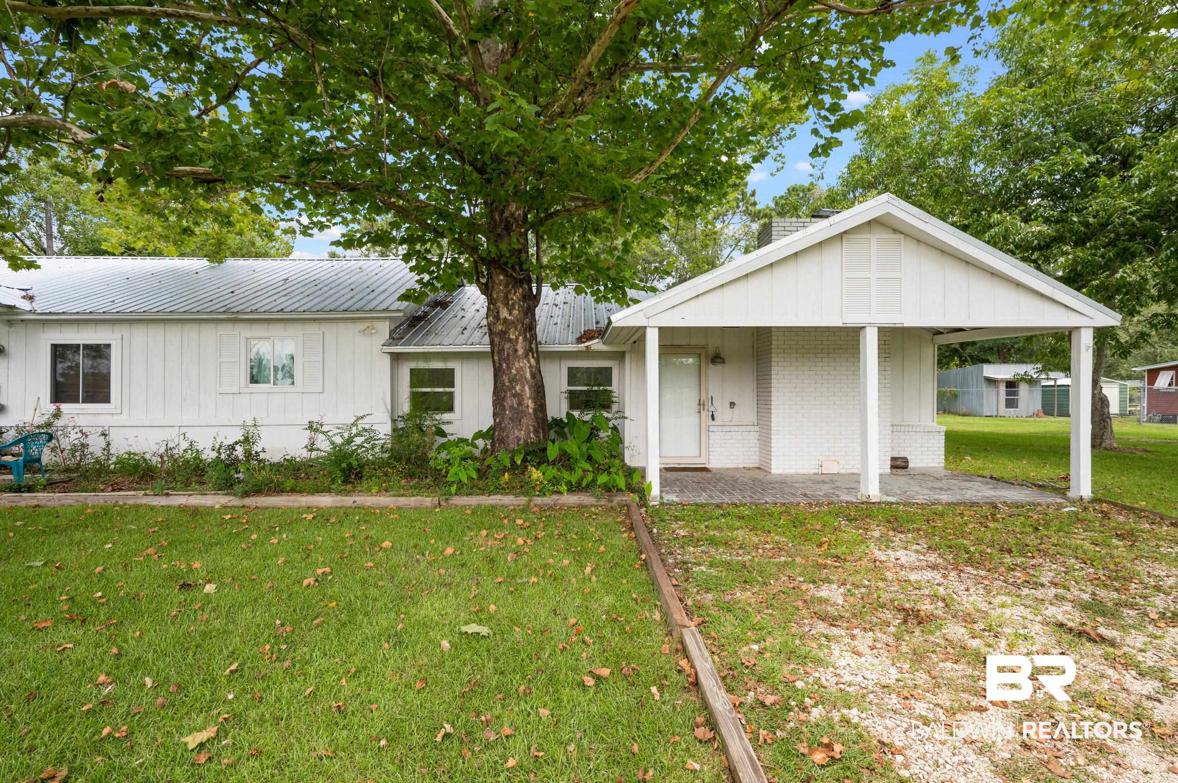 Income Potential Meets Farmhouse Charm in Elberta