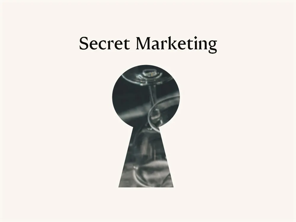 "Secret Marketing" text above a keyhole shape revealing wine glasses inside, against a light background.