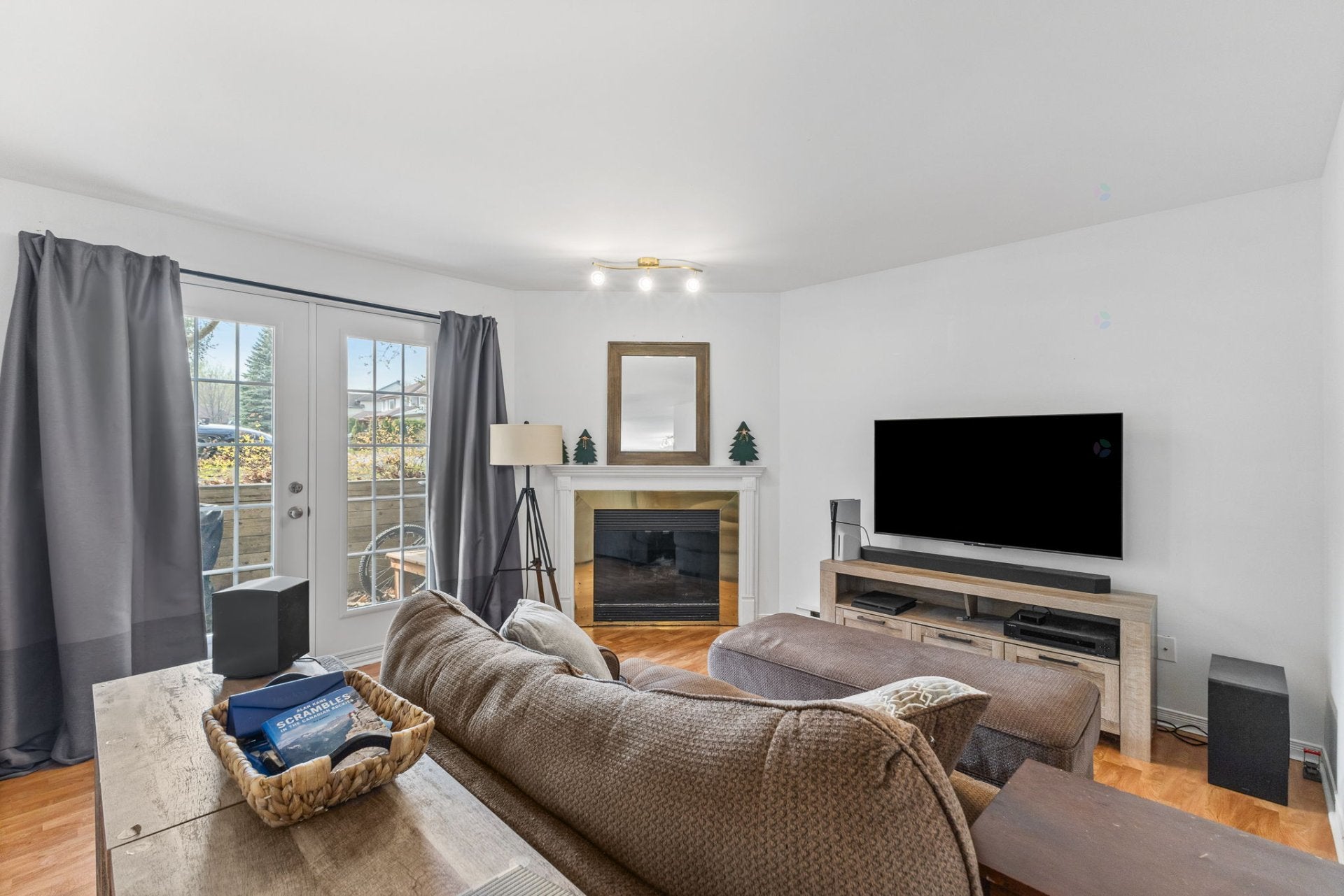 Bright condo with a fireplace and a large private terrace
