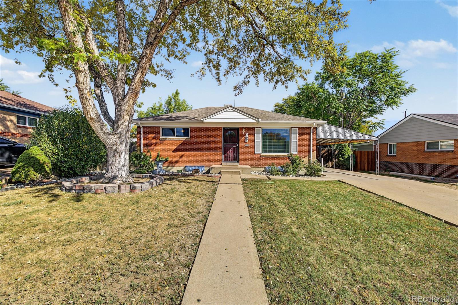 Flexible Two-Level Living in an All-Brick Perl Mack Ranch