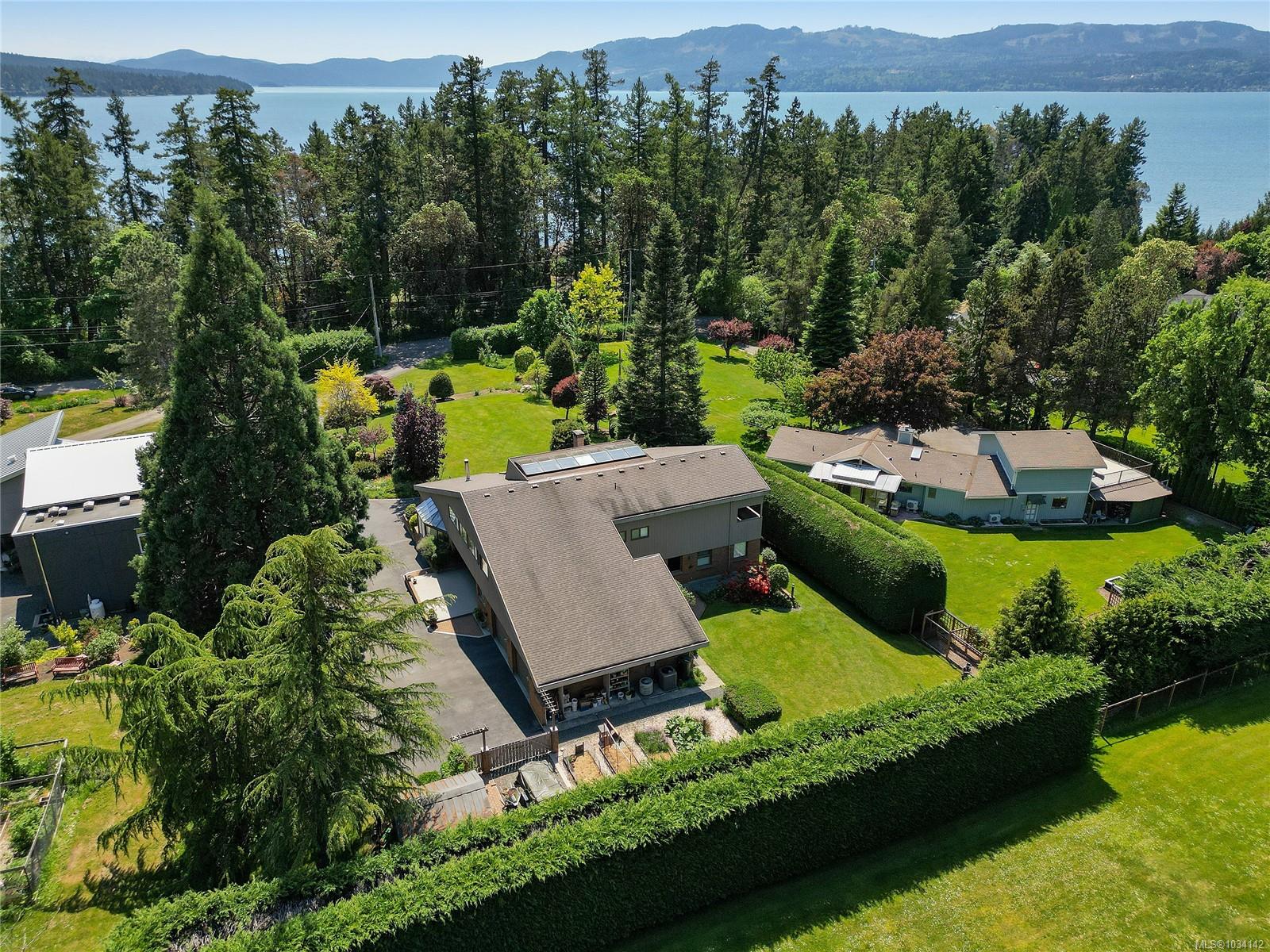 Exceptional Deep Cove Retreat Steps to the Ocean