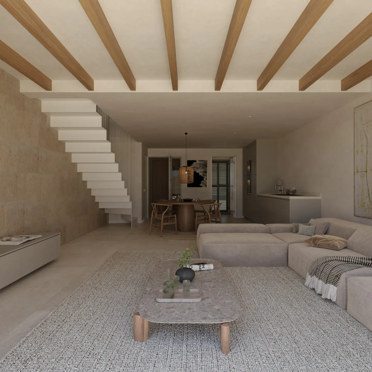 Open-concept living space with exposed wood beams, white stairs, and a large sectional sofa. A dining area is visible in the background.