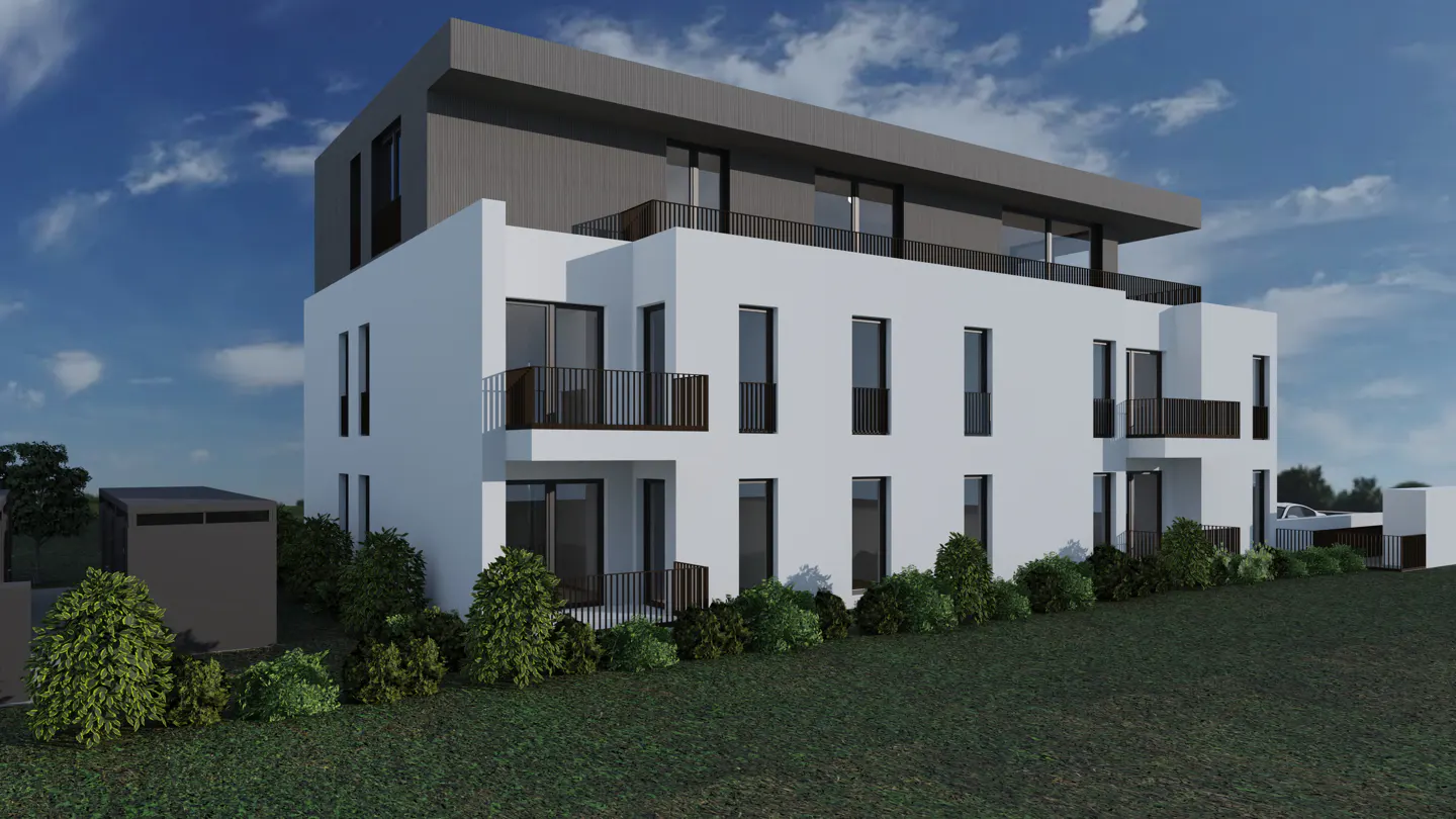 Modern three-story white apartment building with black balconies and a gray top floor, set on a green lawn under a blue sky.
