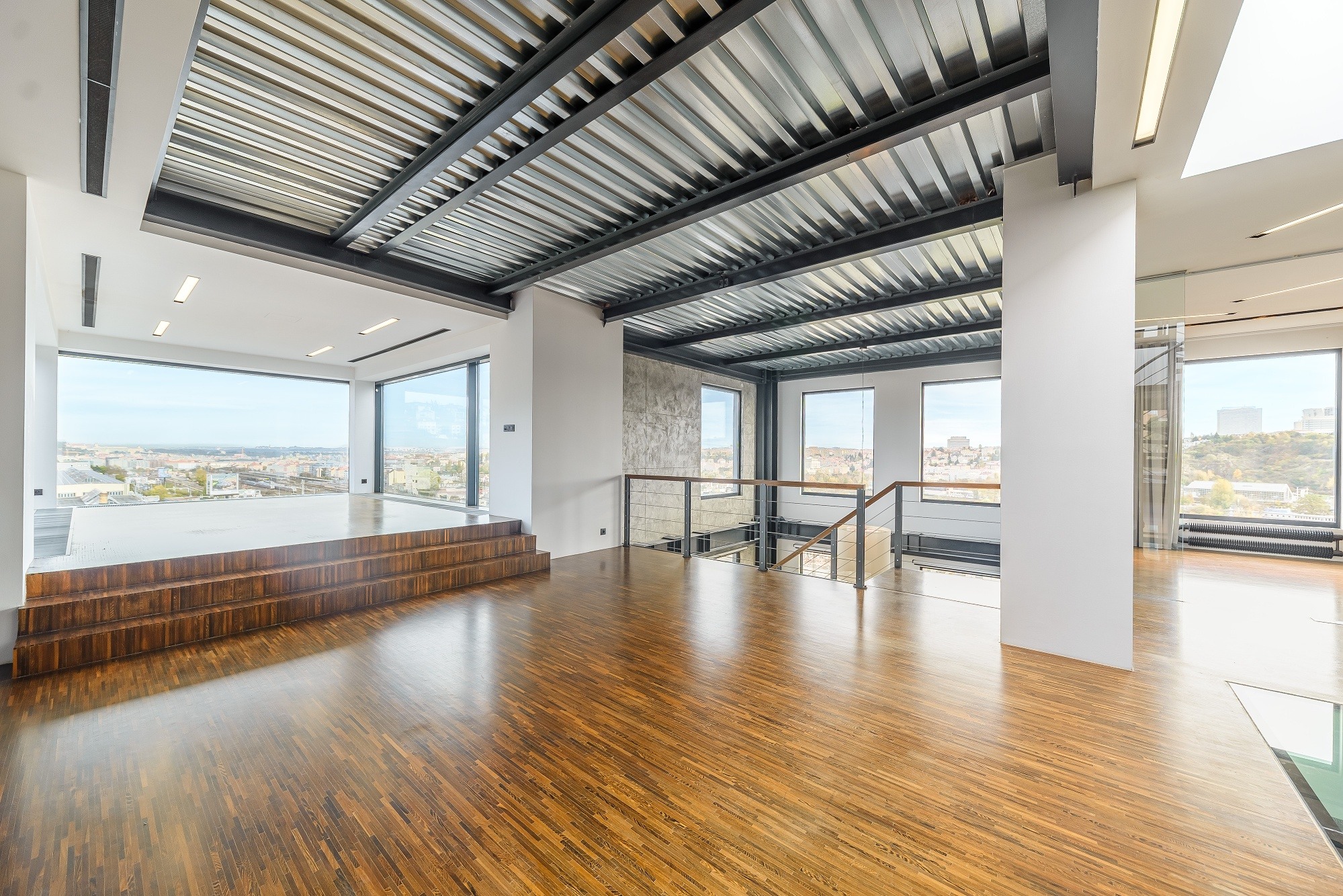 Rent a duplex apartment with a rooftop terrace offering panoramic views