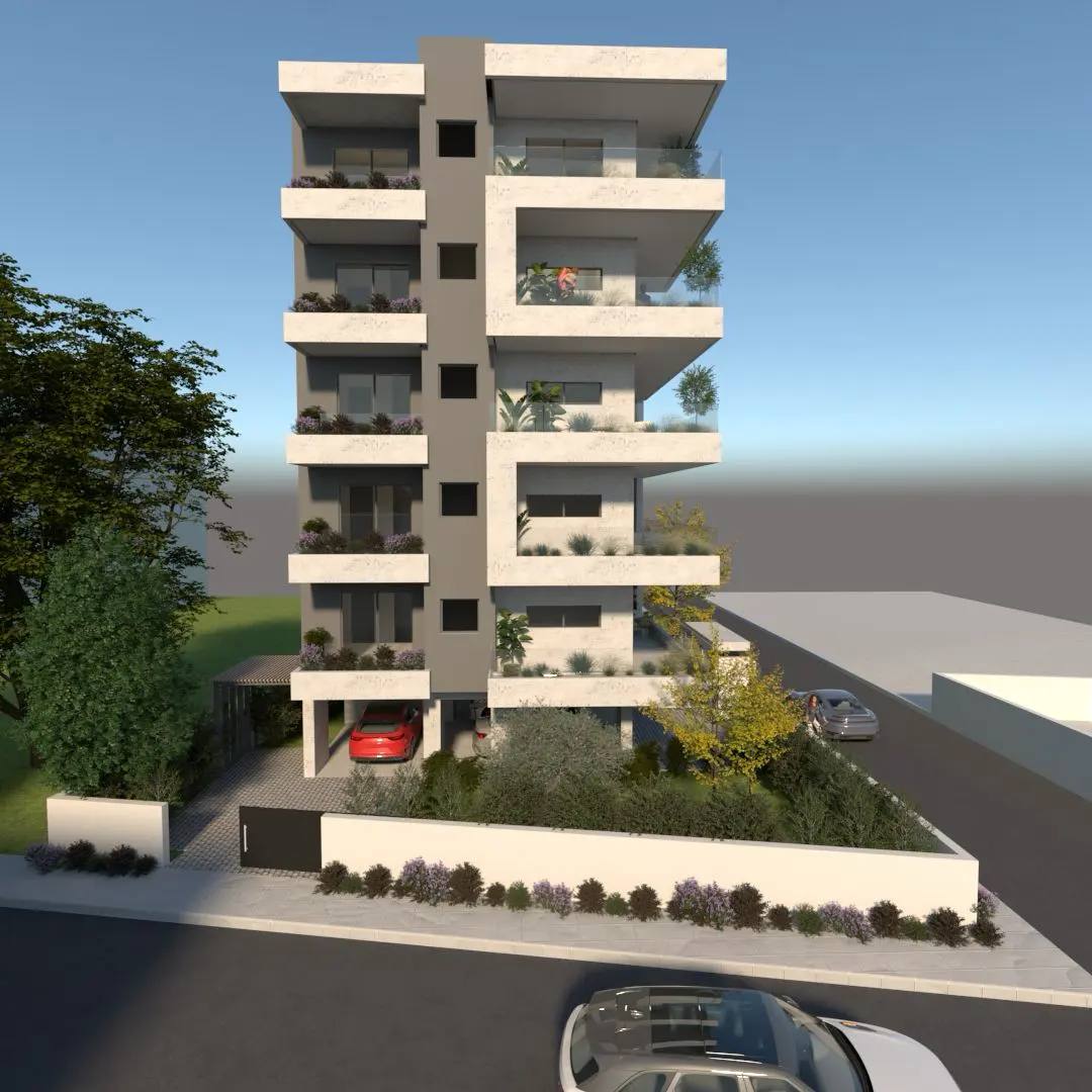 Modern five-story apartment building with white and grey facade, balconies, and ground-level parking on a sunny day.