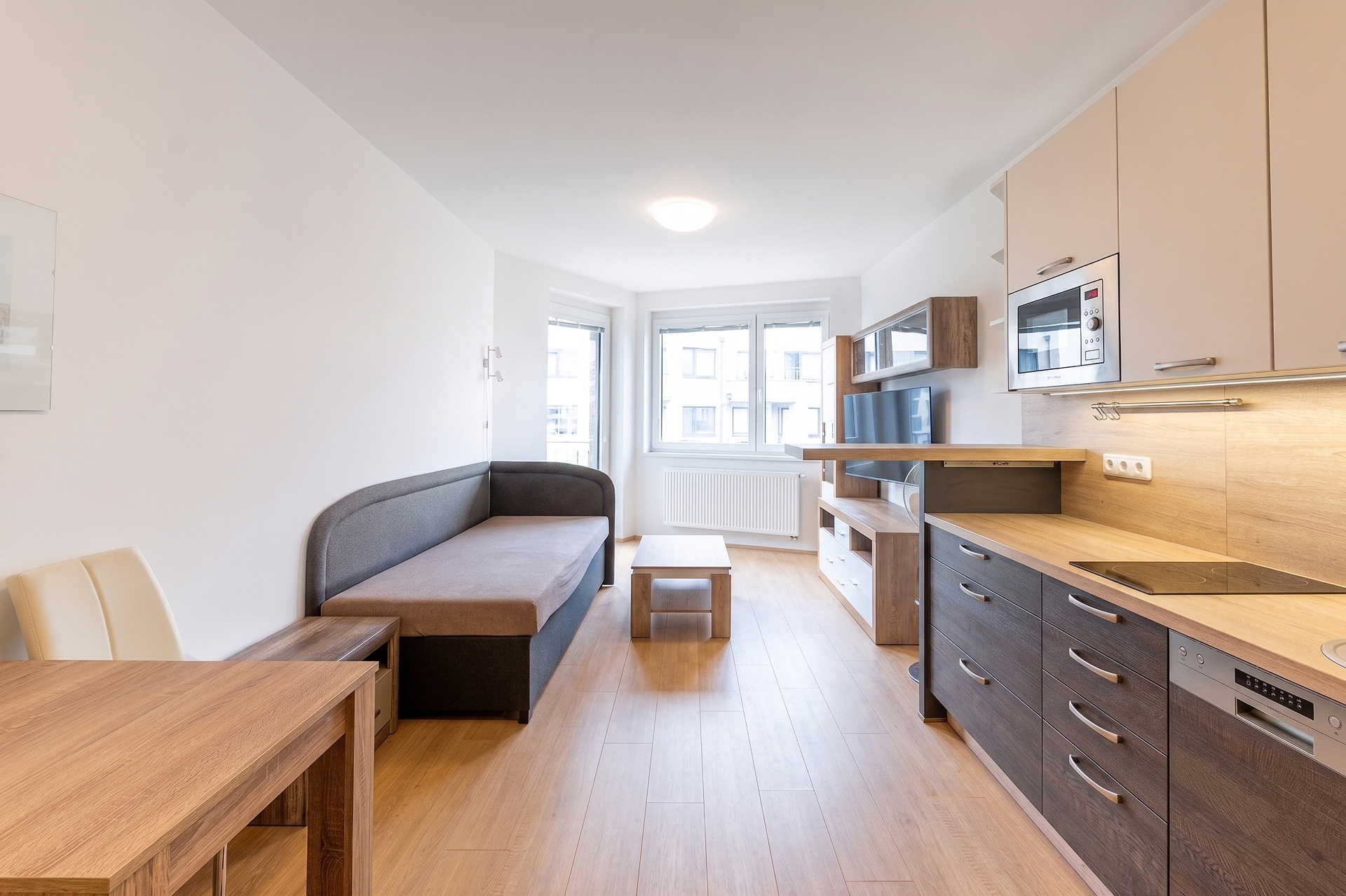 Sale of a 1+kt studio apartment in a new building with a balcony and a garage parking space