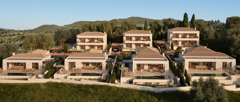 A complex of modern white villas with private pools and tiled roofs nestled in a lush, hilly Mediterranean landscape.