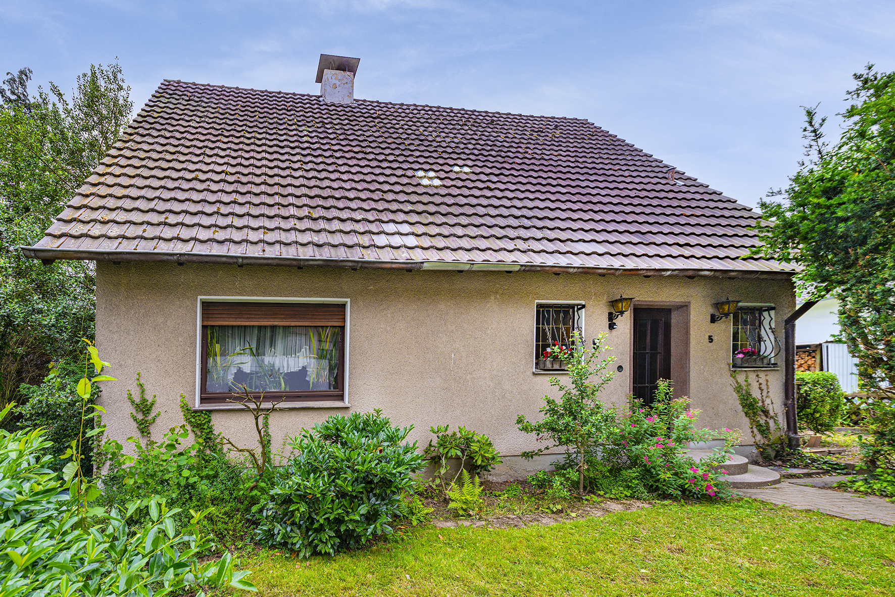 Sanierung oder Neubau - Einfamilienhaus mit Garage auf schönem Grundstück