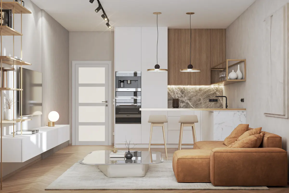 A modern living room and kitchen area with a brown sofa, white cabinets, and marble countertops.