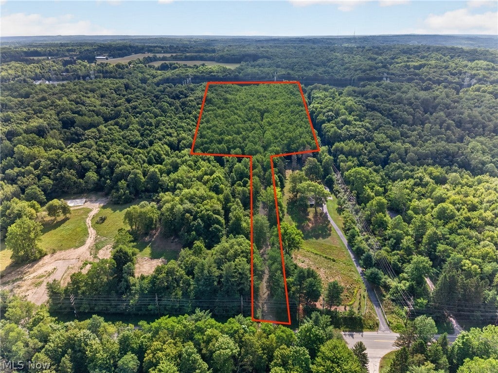 Secluded Wooded Lot in a Prime Location in Novelty