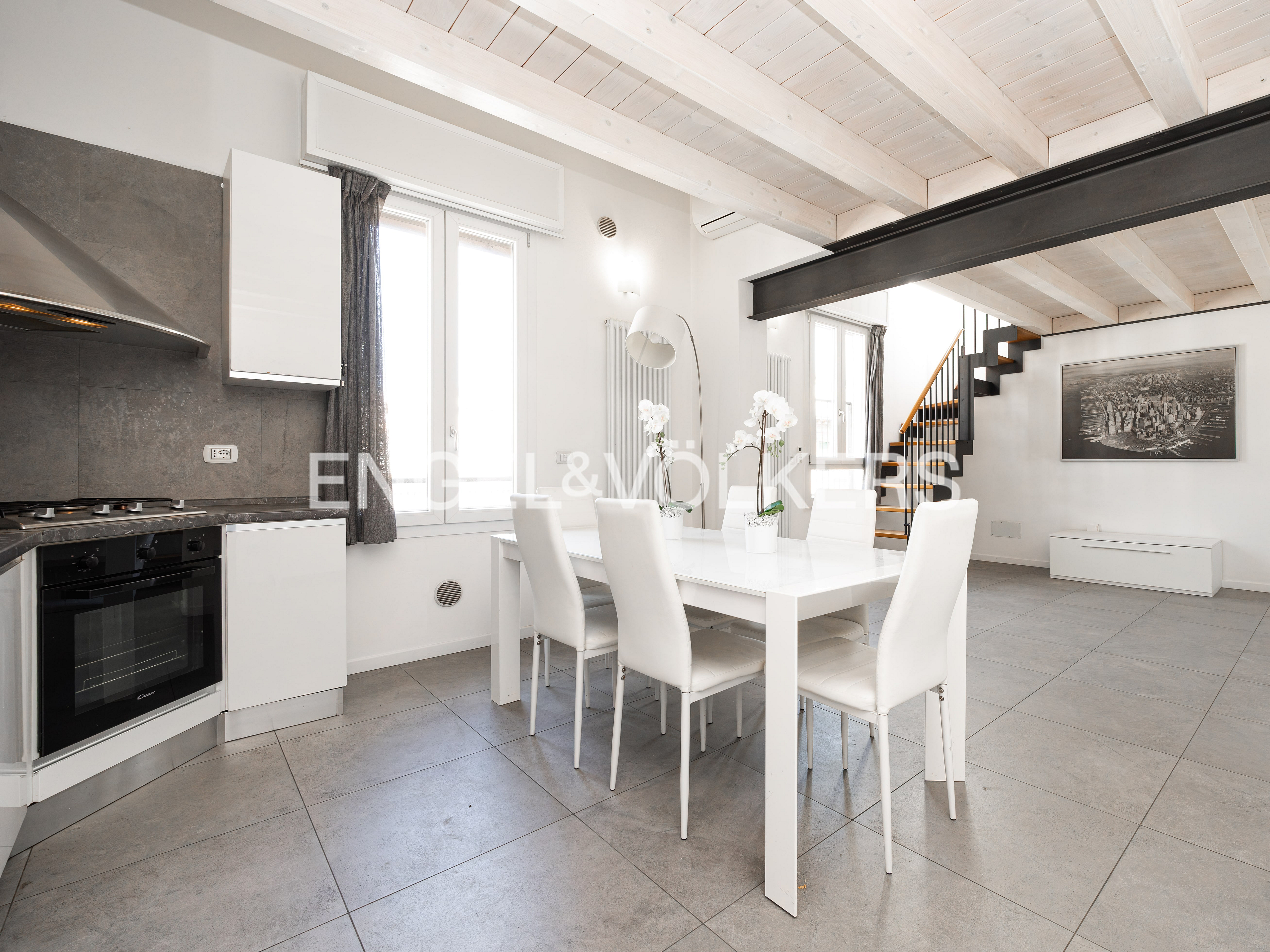 Elegant top-floor duplex steps from the city center