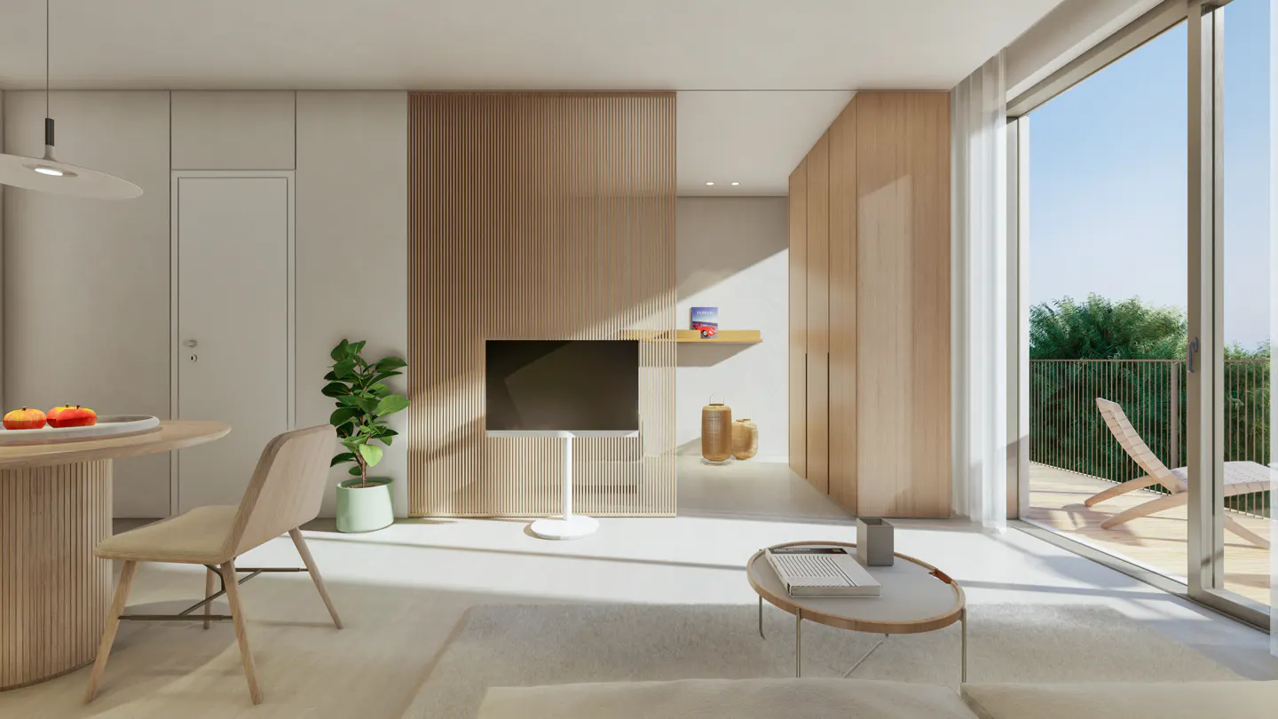 Bright, modern apartment interior with wood accents, a TV, and a balcony view of lush greenery.