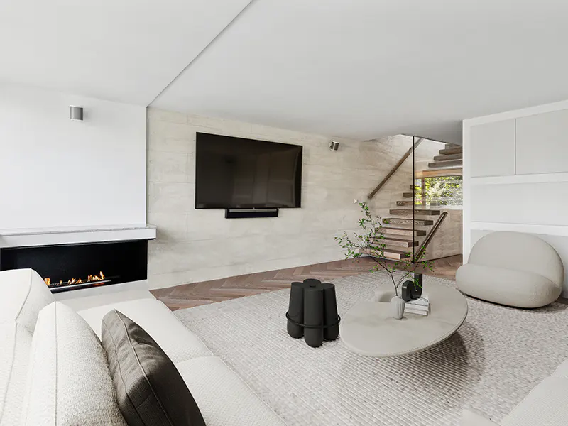 Modern living room with white walls, fireplace, TV, and staircase. A white sofa and rug add to the bright, minimalist aesthetic.