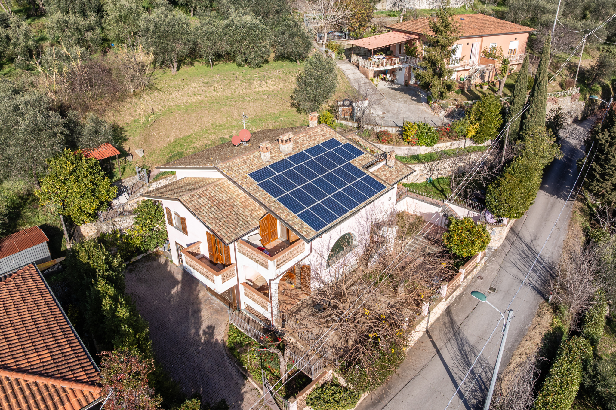 Multi-level villa with large windows and panoramic views
