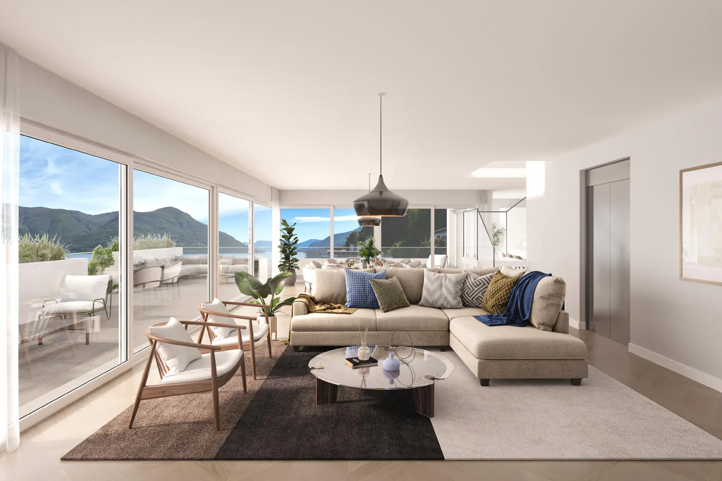Modern living room with beige sectional, glass coffee table, and floor-to-ceiling windows overlooking a mountain lake view.