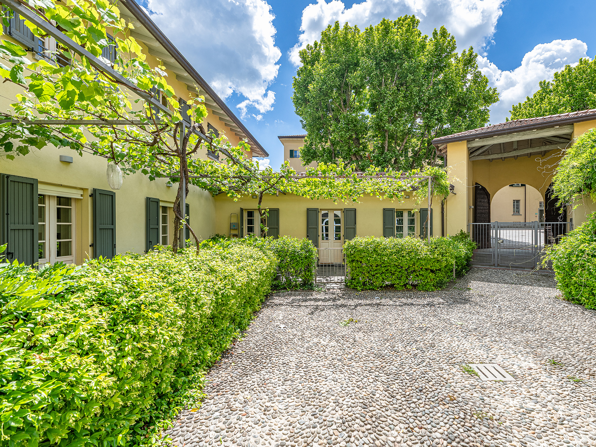 Charming two-room apartment with private garden and garage