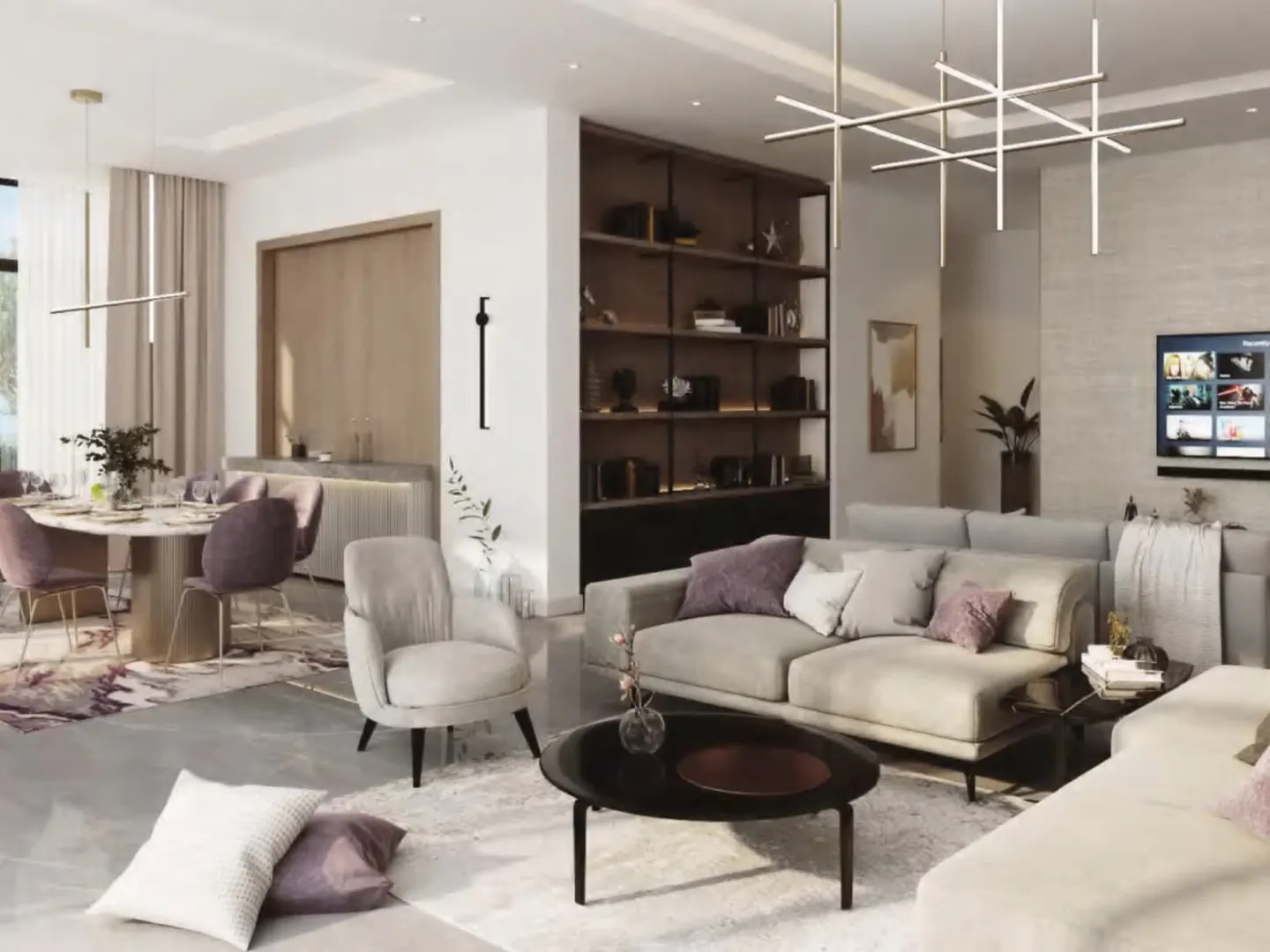 A modern living and dining area with a gray sofa, black coffee table, and purple dining chairs. A bookshelf and TV are in the background.