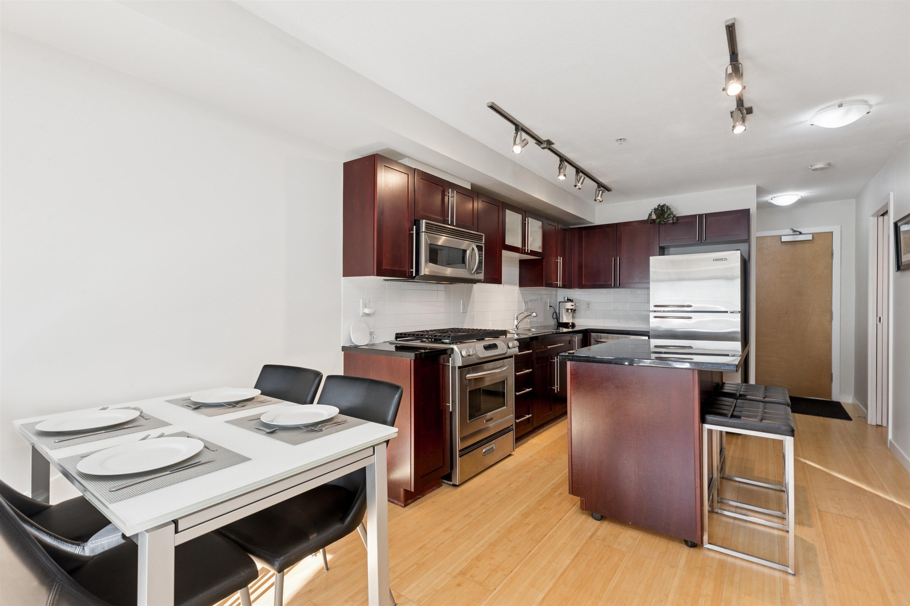 Perfectly Located 1 Bedroom + Den Corner Unit