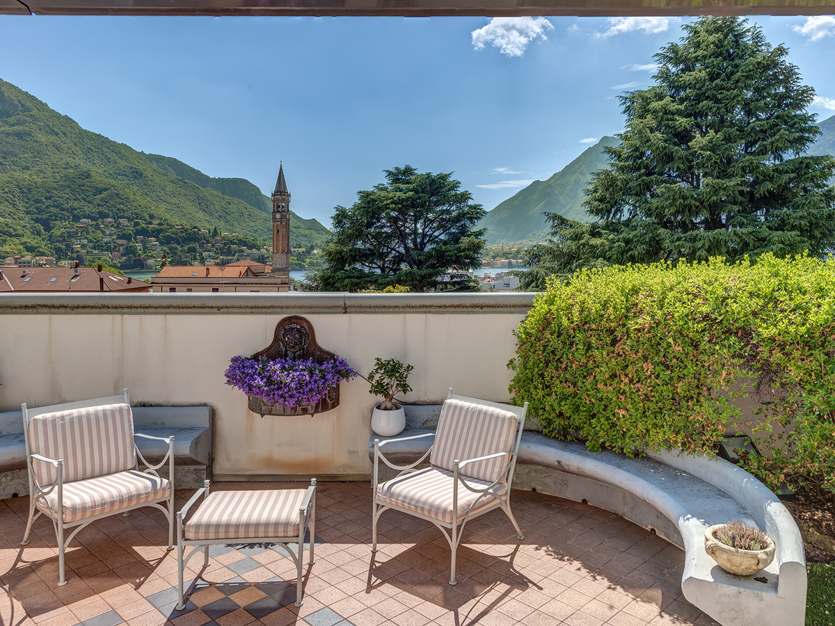 Luxury penthouse with panoramic terrace and lake views