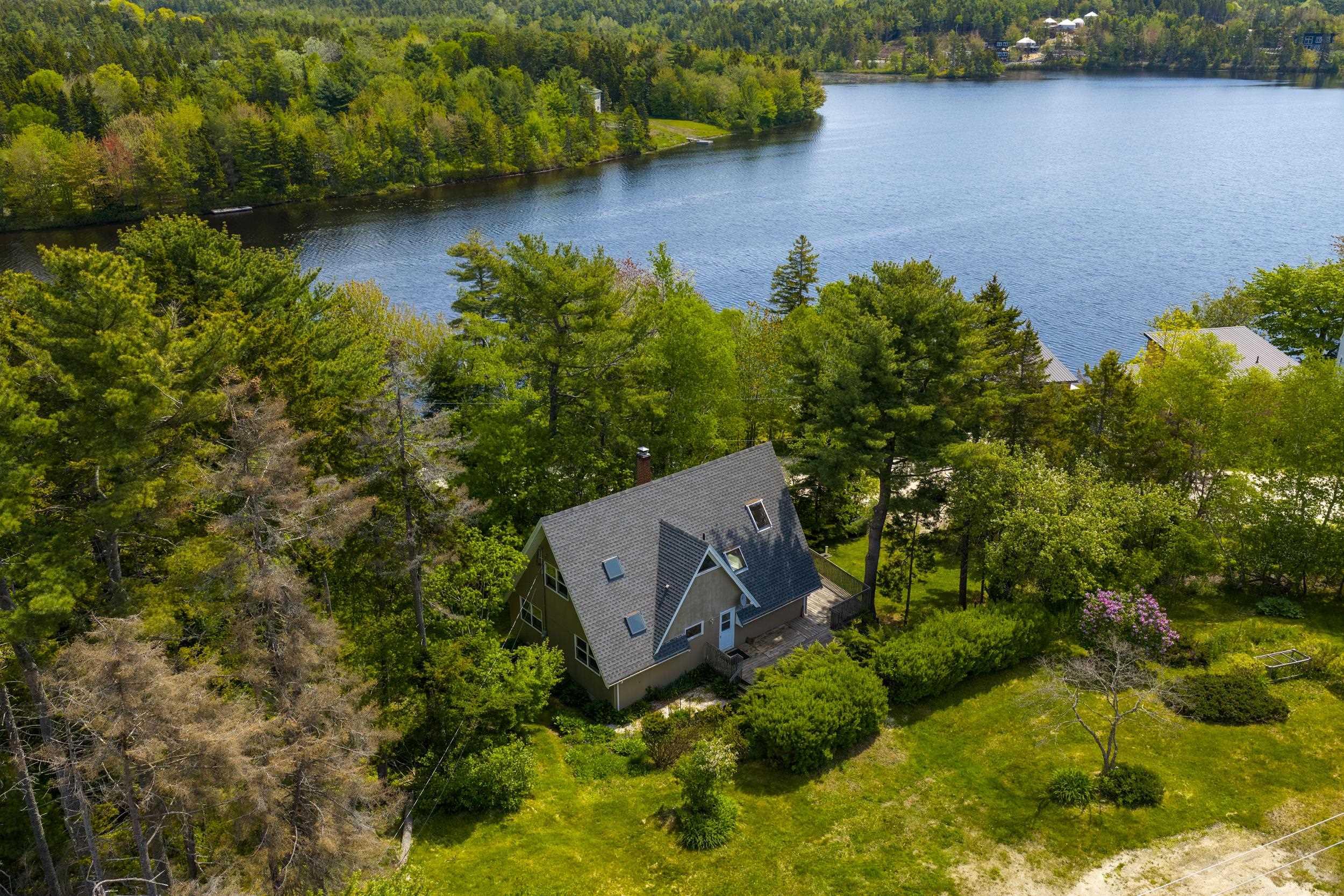 Chalet Style Home with Direct Water Frontage