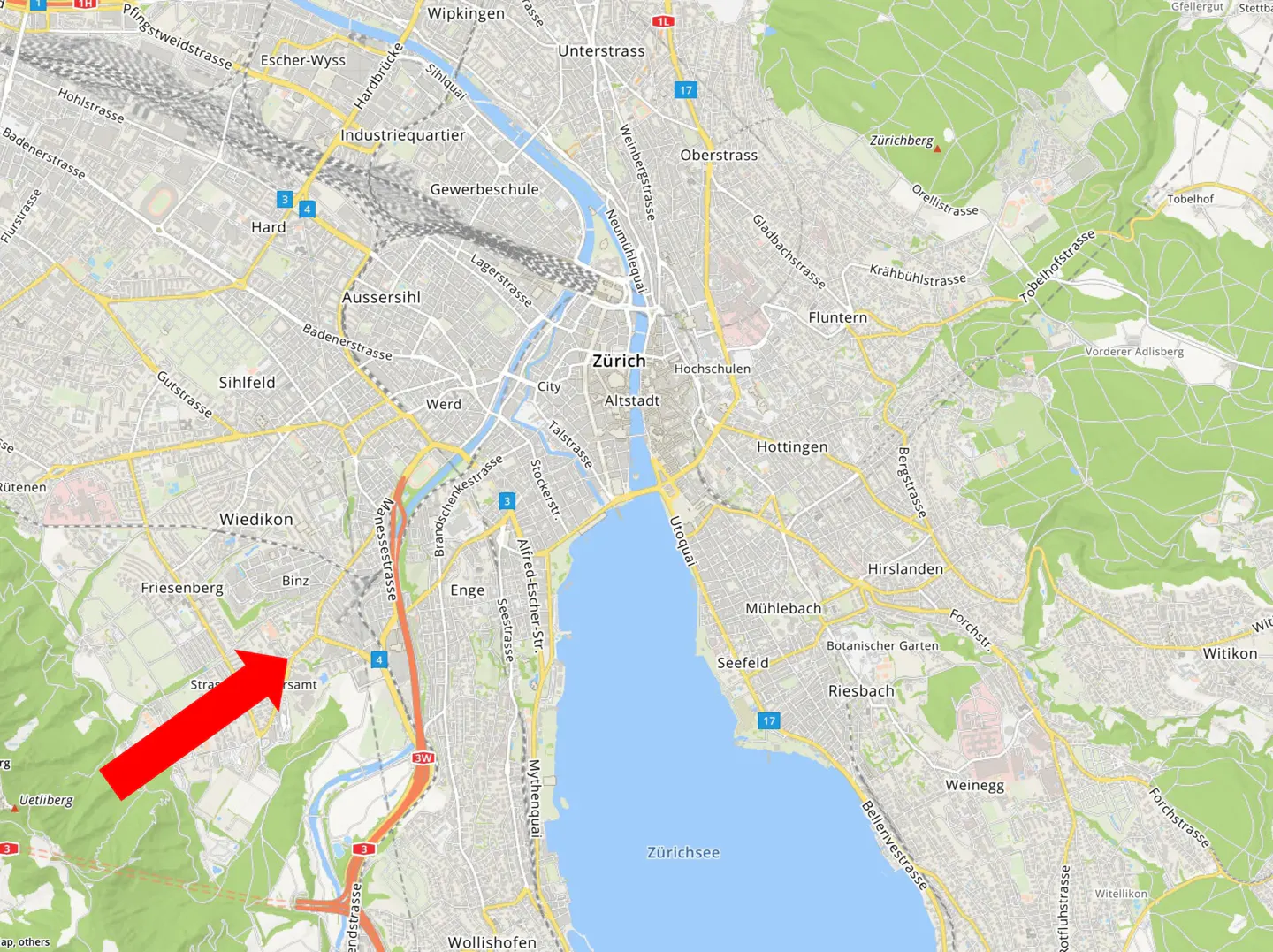 Map of Zurich, Switzerland, with a red arrow pointing to the Friesenberg neighborhood. Lake Zurich is visible to the east.