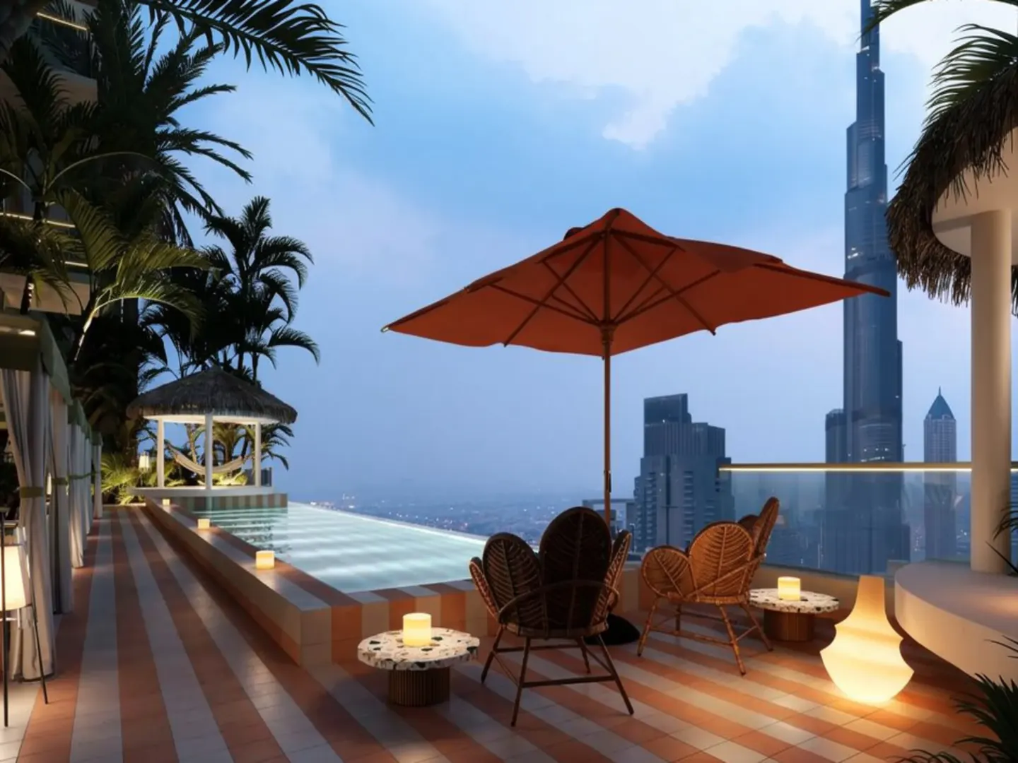 Rooftop pool with Burj Khalifa view. Orange umbrella, wicker chairs, and palm trees create a luxurious outdoor space. Striped tile floor.