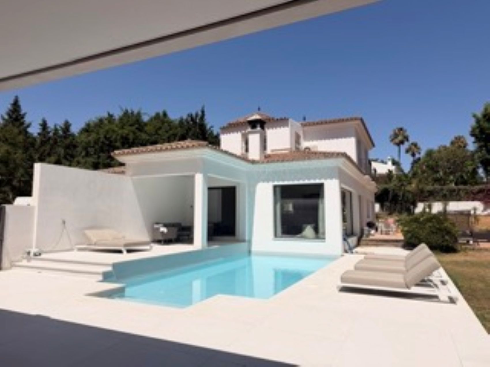A Family Haven in Sotogrande Costa with Expansive Gardens & Beautifully Renovated Pool Area