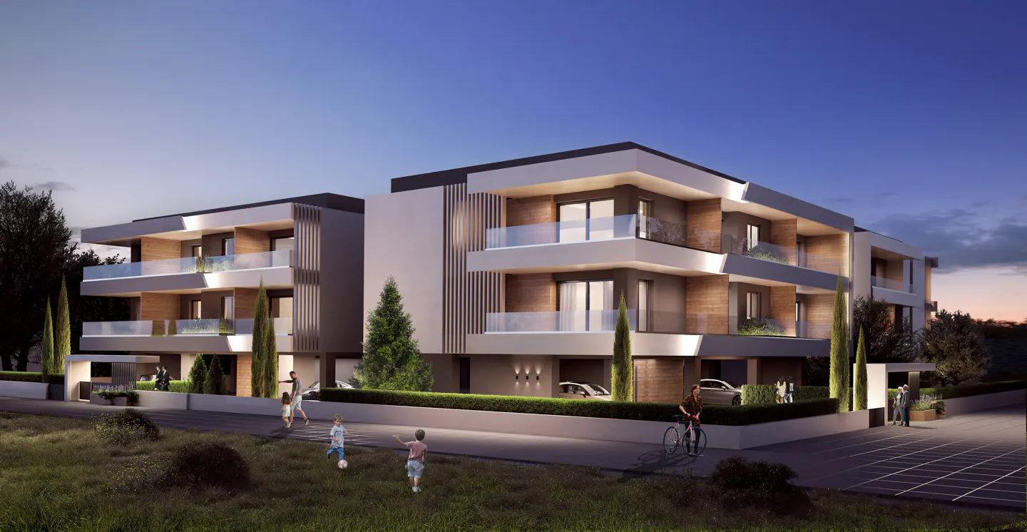 Modern, multi-story apartment building with balconies, cars parked, and people walking and playing outside at dusk.